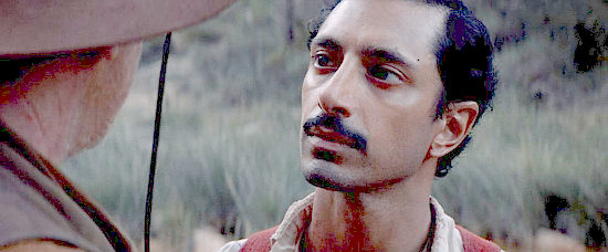 Riz Ahmed as Hermann Kermit Warm talks about his dreams of founding a new peaceful, democratic new community in The Sisters Brothers (2018)