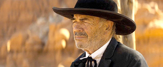 Robert Forster as a tired preacher with a warning about the West in Damsel (2018)