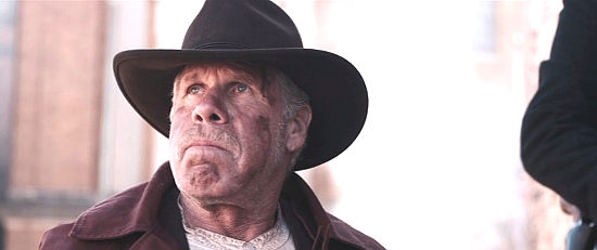 Ron Perlman as Charlie Storm, ex-outlaw turned Reeves' sidekick in Hell on the Border (2019)