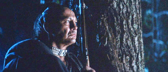 Russell Means as Chingachgook, on the watch for trouble in Last of the Mohicans (1992)