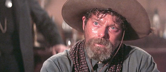Stephen Lang as Ike Clanton, wondering if he's getting a fair shake at faro in Tombstone (1993)