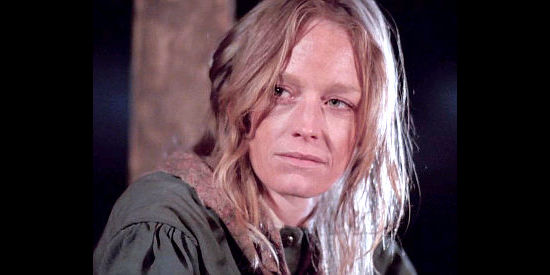 Suzy Amis is Martha Cable, a woman with a marriage strained by war in Last Stand at Saber River (1997)