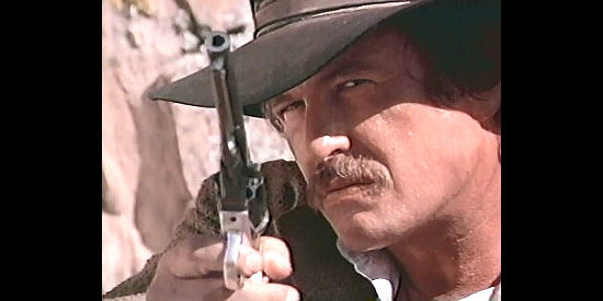 Tom Berenger as Miles Utley, issuing a warning to an old friend in Avenging Angel (1995)