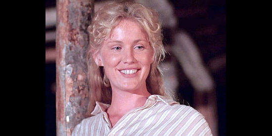 Tracey Needham as Lorraine Kidston, turning her charm on Paul Cable in Last Stand at Saber River (1997)