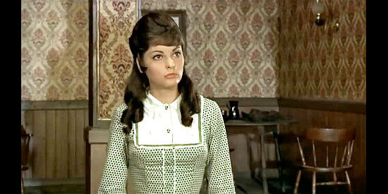 Angela De Leo as barkeep's daughter Judy, trying to avoid Monteiro and his men in The Winchester Does Not Forgive (1967)