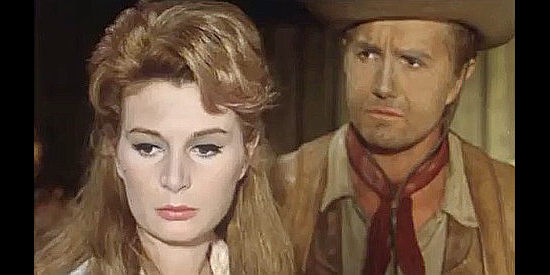 Dana Ghia (Ghia Arlen) as Jenny Slater, sharing the story of Ranger City with Norman Sandel (Giacomo Rossi Stuart) in Degueyo (1965)