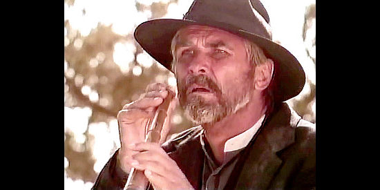 James Brolin as John Parsley, a former preacher spotting an unwelcome sight in Gunsmoke, The Long Ride (1993)
