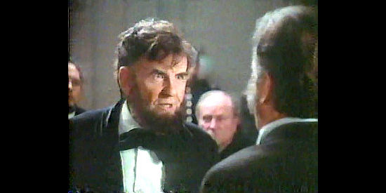 James Getty as Abraham Lincoln, making a point with the engineer Ericsson in Ironclads (1991)