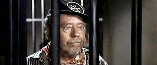 Jesus Puch as Benjamin Franklin (Chuck) Everett, the jailhouse helper, in Ranch of the Ruthless (1965) 