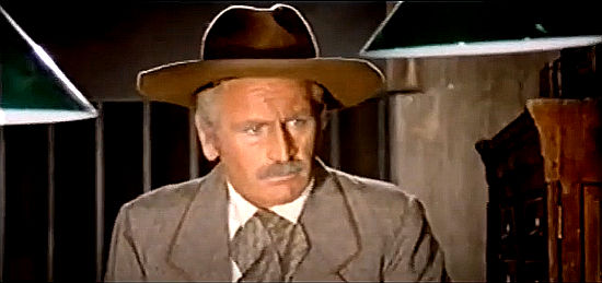 Luis Induni as Tucan, trying to frame Djurado for a crime he didn't commit in Djurado (1966)
