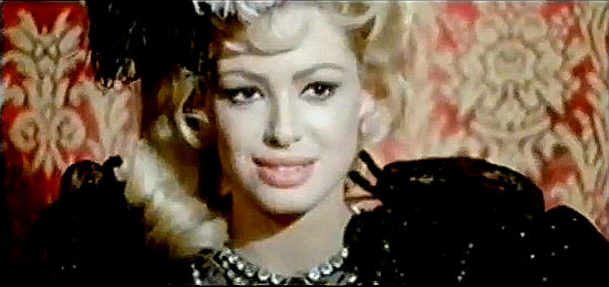 Margaret Lee as Mitzy, the saloon girl who'll do anything for Djuardo in Djurado (1966) 