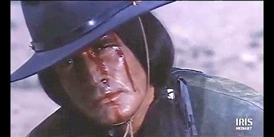 Mimmo Palmara (Dick Palmer) as an Indian sheriff determined to complete his mission in And His Name Was Holy Ghost (1971)
