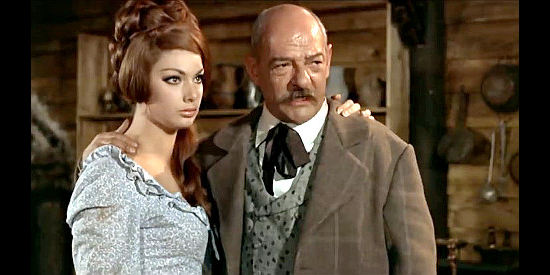 Monika Brugger as Christy McKenzie, getting close to the enemy (Livio Lorenson as Lash) to save Hal in The Winchester Does Not Forgive (1967)