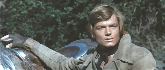 Peter Lee Lawrence as Robert MacGregor, a man with a bounty to collect and a score to settle in More Dollars for the MacGregors (1970)