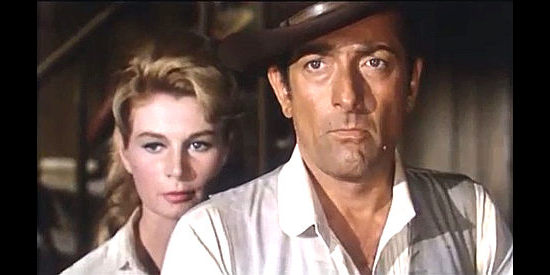 Riccardo Garrone (Dick Regan) as Foran and Dana Ghia (Ghia Arlen) as Jenny Slater, figuring it might be time to leave Ranger City in Degueyo (1965)