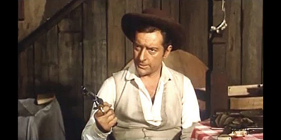 Riccardo Garrone as Foran, the whiskey salesman who finds new friends, a new woman and new enemies in Ranger City in Degueyo (1965)