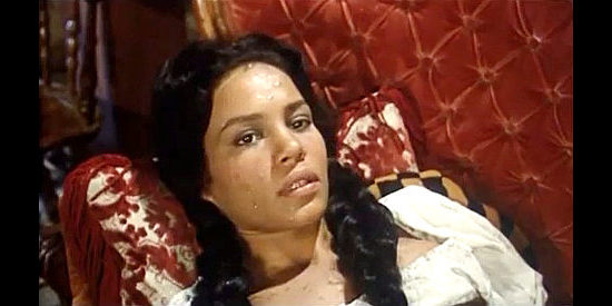 Rosy Zichel as Rosy, Ramon's former girlfriend, warns of his deadly plan for Ranger City in Degueyo (1965)