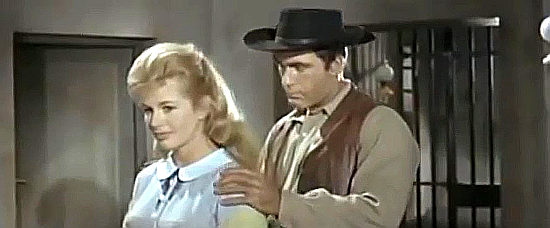 Sabine Bethmann as Georgiana White, making up with Sheriff Oklahama Dan Cross (Richard Hornbeck) in Ranch of the Ruthless (1965)