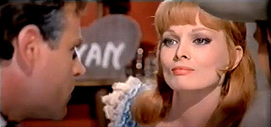 Scilla Gabel as Barbara Donovan, being questioned about Dujardo's whereabouts in Djurado (1966)