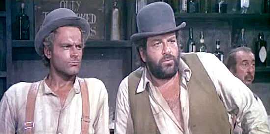 Terence Hill as Trinity and Bud Spencer as Bambino survey a bar for trouble in Trinity is Still My Name (1971)