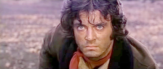Antonio Cantafora as Tab, a member of the band trying to get its share of the bank loot in Shoot Joe and Shoot Again (1971)