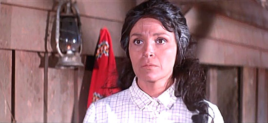 Carla Calo (Caroll Brown) as Rosario, El Chacal's woman, who raises his kidnapped son in Seven Dollars on the Red (1966)