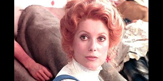 Catherine Deneuve as Marie-Heiene de Boismonfrais, helping stuff dead Indian bodies in Don't Touch the White Woman (1974)