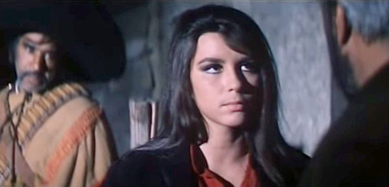 Daniela Giordano as Paquita, Pedro's woman, coming up with a plan to put Joe Williams in trouble in Long Day of the Massacre (1968)