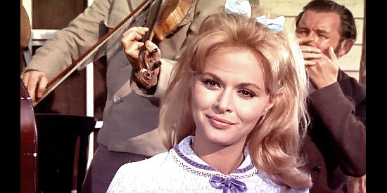 Evi Marandi (Evy Marandis) as Anne, the former neighbor of Rudy, now all grown up in Three Lead Dollars (1964)