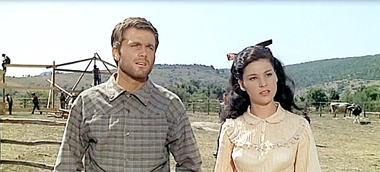 Franco Nero as Charlie Garvey and Emma Valloni as Bess Cordeen in The Tramplers (1965)