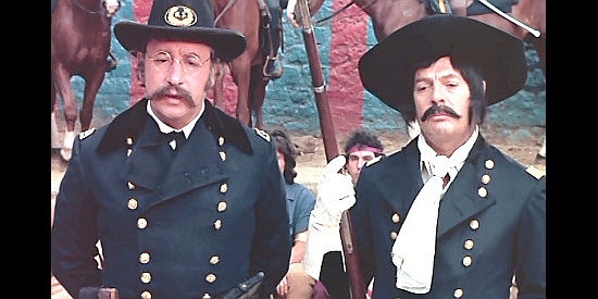 Gen. Terry (Philipppe Noiret) and George Custerr (Marcelloo Mastroianni) present the Indians with options they knew will lead to war in Don't Touch the White Woman (1974)