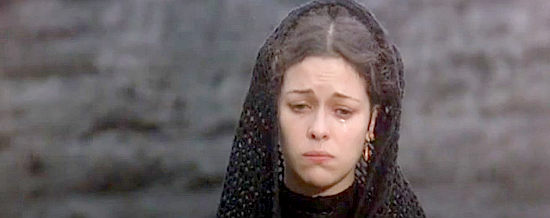 Isabel Mestres as Barbara Sebanek, mourning the death of husband Virgil in China 9, Liberty 37 (1978)