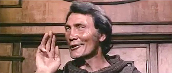 Jack Palance as Buck Santini, the pretend monk with a big appetite in Tedeum (1972)