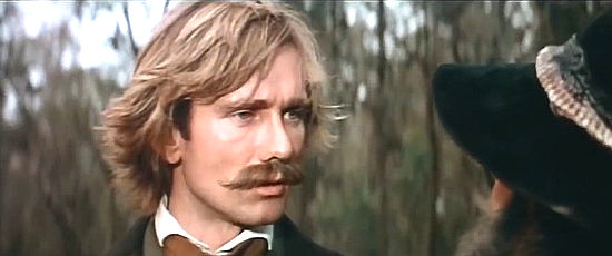 John Hargreaves as Baylis, a victim who becomes a hunter in Mad Dog Morgan (1975)