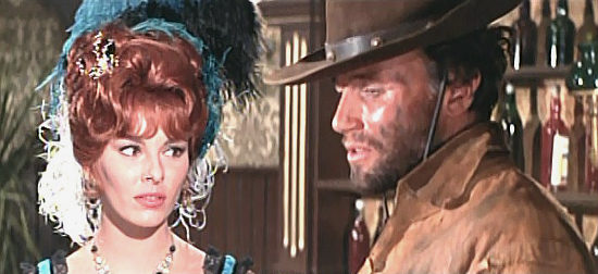 Loredana Nusciak as Emily and Anthony Steffen as Johnny Ashley talk about his long quest to find his son in Seven Dollars on the Red (1966)