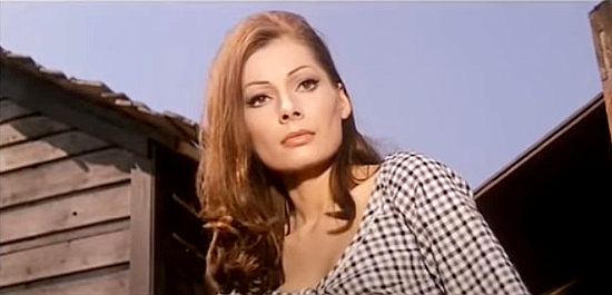 Luisa Baratto (Liz Barrett) as Lara, surprised by boyfriend Joe Williams' sudden reappearance in Long Day of the Massacre (1968)