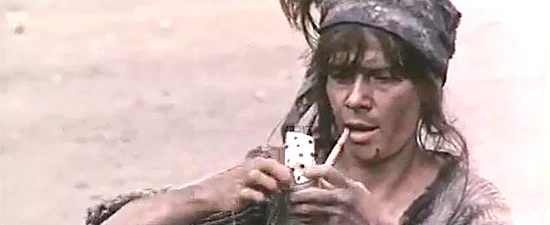 Maria Vico as Ma Manure finds someone new to smoke in her pipe in Tedeum (1972)