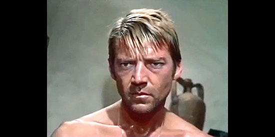 Mickey Hargitay as Mike Wood, fearful of a bad omen he's just found in Ringo, It's Massacre Time (1970)