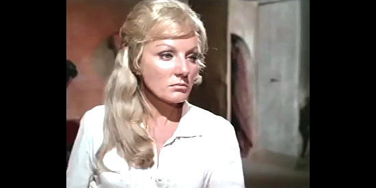 Nancy, the waitress at the tavern where travelers stop in Ringo, It's Massacre Time (1970)