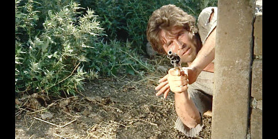 Peter Martell as Pot, aka Cheerful, in a not so cheerful mood during a gunfight in His Name was Pot … But They Called Him Allegria (1971)