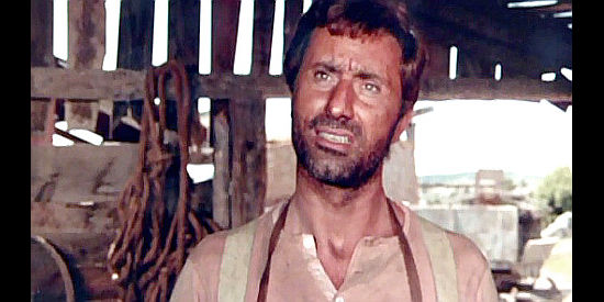 Raff Baldassarre as Joe Porter, the blacksmith who gives Danny a job in Prey of the Vultures (1972)