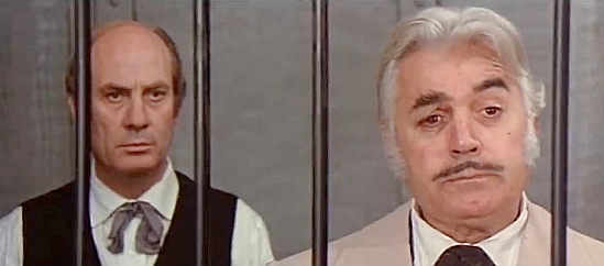 Renato Baldini (right) as the bank director with a cannon in his vault in Crazy Bunch (1974)