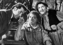 Richard Conte as Dr. Alexander Meade listens to a watch Big Jack Horner (Wallace Beery) has 'collected' while Marjorie Main (Flapjack Kate) listens too in Big Jack (1949)