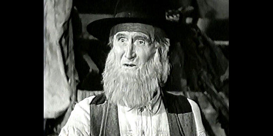 Russell Simpson as Brother Elijah Walker, welcoming Bascomb and Bart to the wagon train in Bad Bascomb (1946)