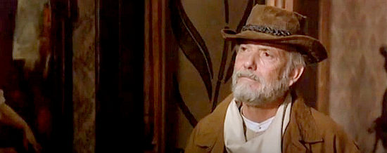 Sam Peckinpah as dime novelist Wilbur Olsen, offering to make Drumm famous in China 9, Liberty 37 (1978)