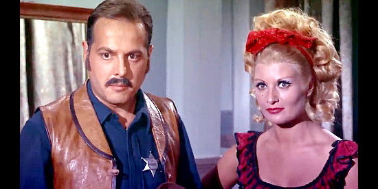 Sheriff Pete, a lawman who knows his place, with saloon singer Nora (Dina De Santis as Dyna De Saint) in Three Lead Dollars (1964)