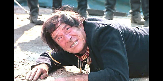 Ugo Tognazzi as Indian scout Mitch, pleading with Custer to leave the cannon behind in Don't Touch the White Woman (1974)