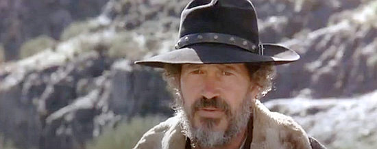 Warren Oates as Matthew Sebanek, facing a moment of truth with Clayton Drumm in China 9, Liberty 37 (1978)