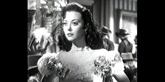 Adele Mara as Catalina, the pretty saloon girl with a pretty voice in The Gallant Legion (1948)