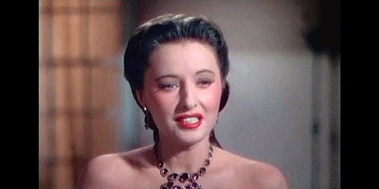 Barbara Stanwyck as Lily Bishop, the scarlet woman looking for happiness in California in California (1947)